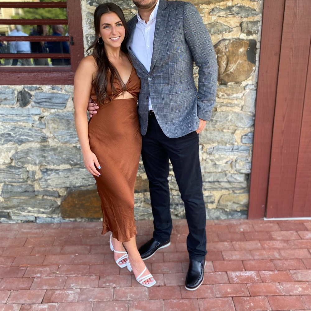 Brown midi dress with tie back.
